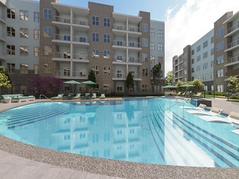 an outdoor pool with an apartment building in the background